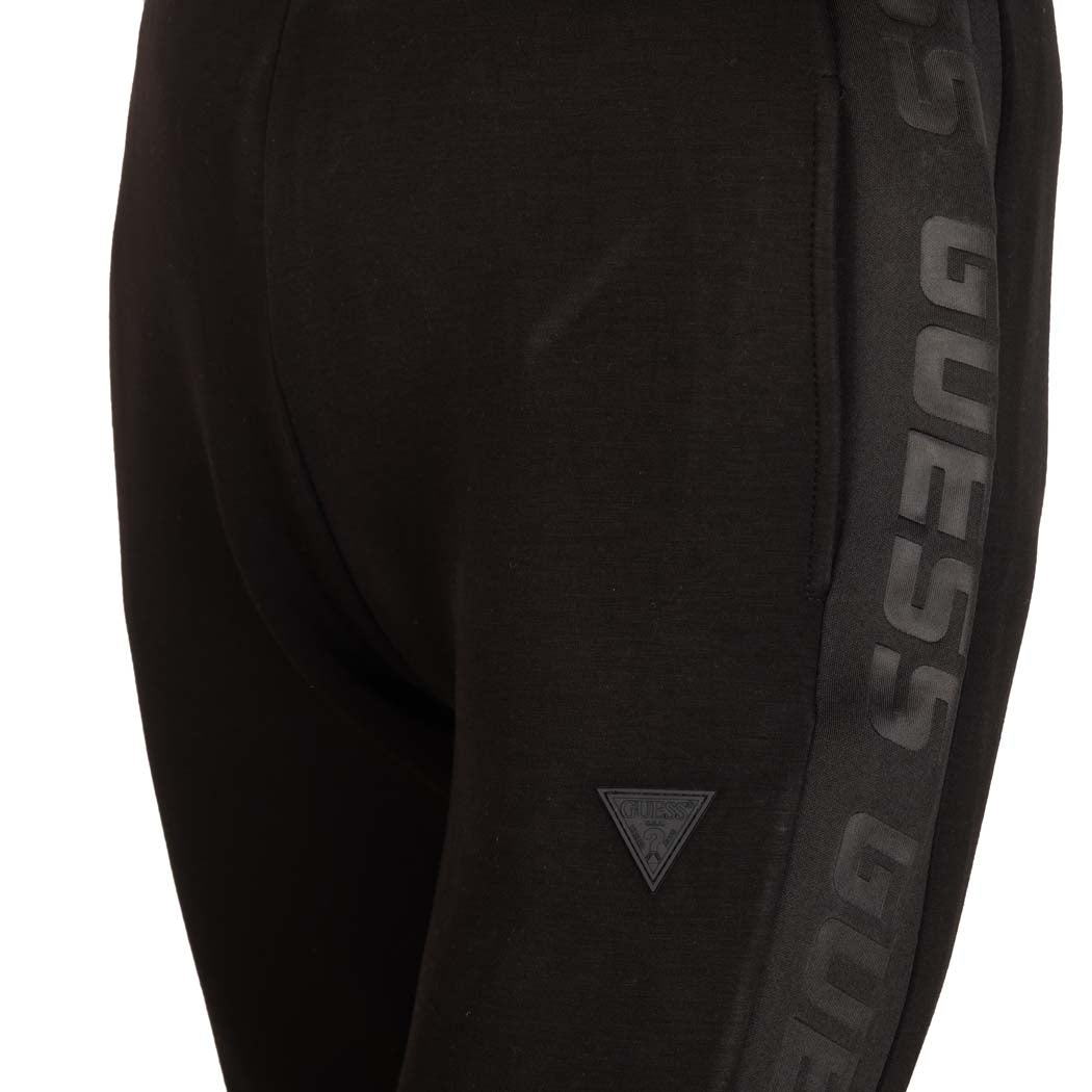 JOGGER DONNA GUESS CON BANDE LOGATE LATERALI - COL. NERO