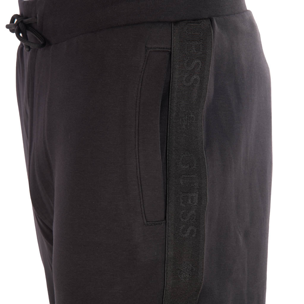 JOGGERS UOMO GUESS CON LOGO LATERALE - Colori disponibili: 2